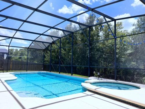 Crescent Lakes House | Privacy 4 Bed 3 Bath Pool Home with Spa home