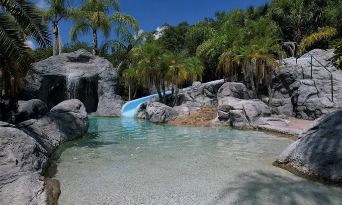 Citrus Park House | Private 6.5 area estate with pool, waterfall, slide, and jacuzzi