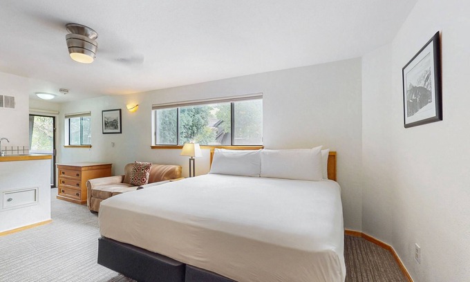 West End Apartment | Private balcony room on Main St - pool & hot tub - walk to lifts, dog-friendly