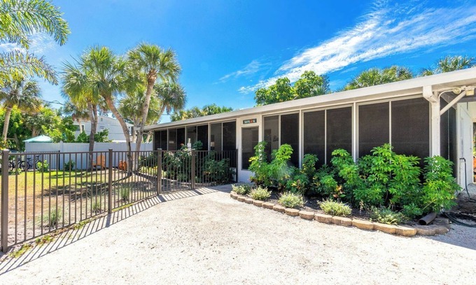 Englewood House | Private beach, bay access to only 5 homes, dog friendly, fenced yard, steps to the water on either side