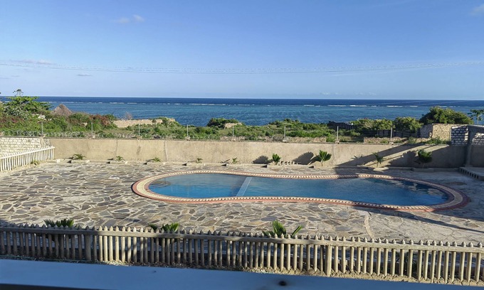 Ras Makamaiwe Apartment | Private beach home with panoramic ocean views