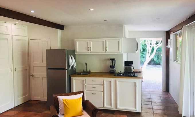 Palm Beach Estates Cottage | Private Beach studio private garden steps from the beach. Bike + Boogie bd incl