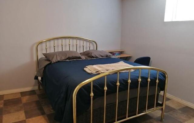 Southeast Calgary House | Private Bedroom in Basement - Erin Woods