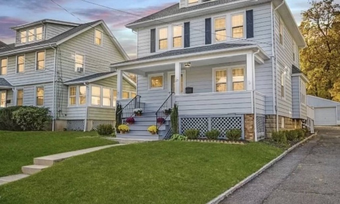 Summit House | Private bedroom in second floor with a share bathroom in a family home.