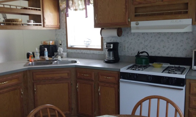 Pulaski House | Private, clean, and cozy North Sandy Pond retreat! Close to beach and marina.