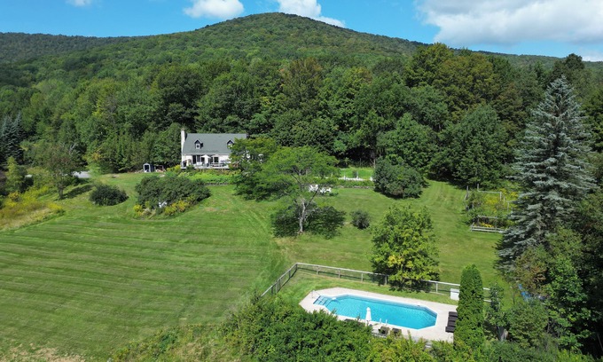 Roxbury House | Private Contemporary Cottage with heated pool, hot tub and wide mountain views.