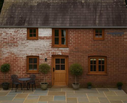 Llangadog House | Private Country Cottage with alfresco garden patio, outdoor tub with country views- Brecon Beacons National Park