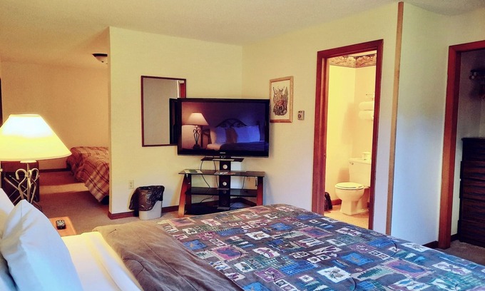 Ironwood Apartment | Private Guestroom inside the Lodge at North Ironwood Acres with three beds and one bathroom. Dog Friendly!