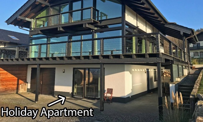 Bruschied Apartment | Private holiday apartment in the Hunsrück with a wonderful valley view and cedar sauna