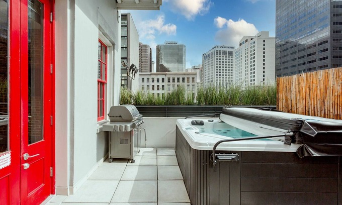 Central Business District Condo | Private Hot Tub, Patio, & Grill! Heated Pool in Courtyard, Family Friendly