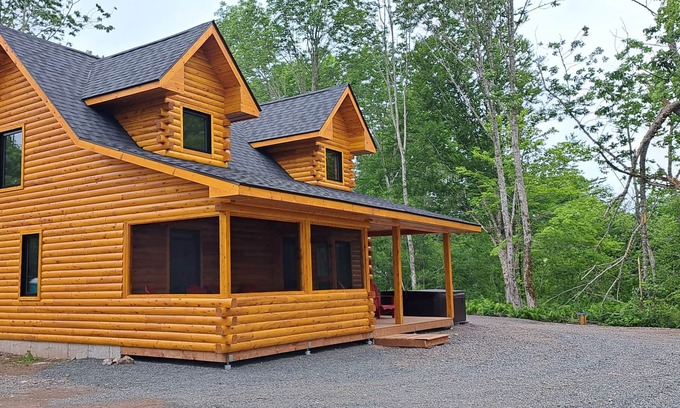 Antigonish County Cabin | Private lakefront log cabin with year-round hot tub.