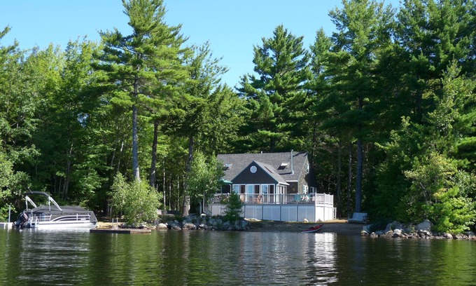Middleton House | Private Peninsula, 600’ Of Waterfront + Sandy Beach on Sunrise Lake