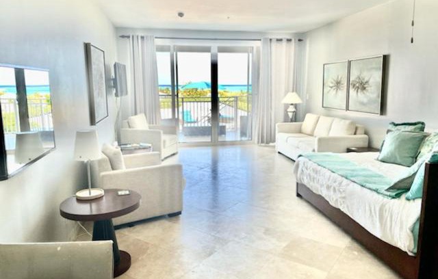 The Bight Apartment | Private Poolside, Loft-Like Condo with Panoramic Grace Bay Views, Walk to Beach, Restaurants, & Turtle Cove Marina!