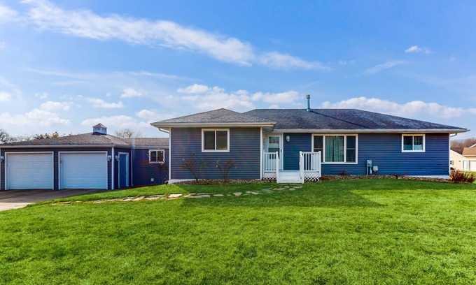 Bridgman House | Private property with three-season room, hot tub, firepit, games, W/D, & AC