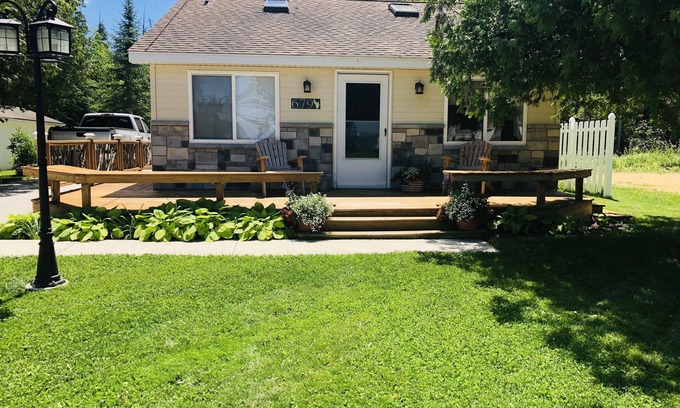 Spruce Cottage | Private sandy beach on Hubbard Lake South Shore