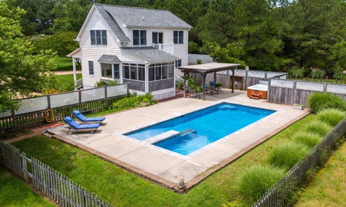 Port Haywood House | Private, secluded waterfront cottage - pool and hot tub feet from the back door.