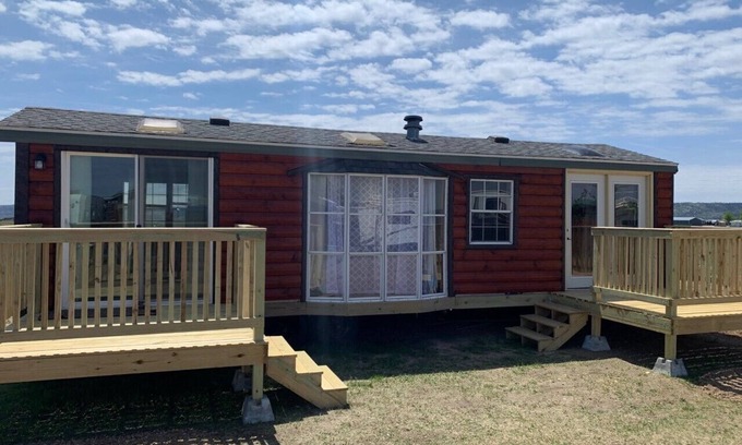 Platte RV Rental | Private Tiny Home with deck, fire pit & patio near Platte Creek Recreation area