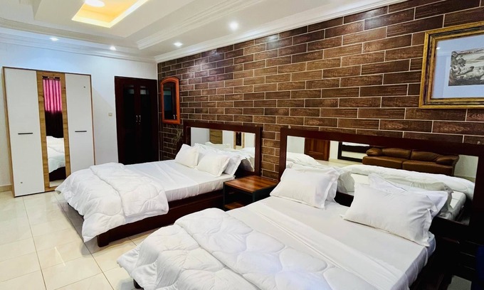 Ouakam Bed & Breakfast | Quad room