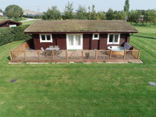 Selby House | Quail Lodge - Nordic Log Cabin