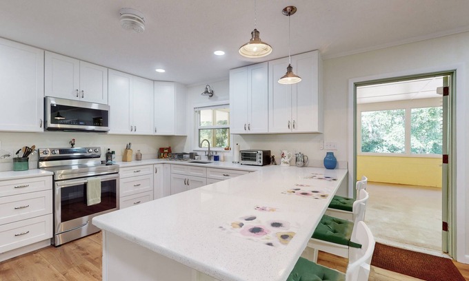 Floral City House | Quaint, countryside bungalow across from bike trail with screened lanai & WFH