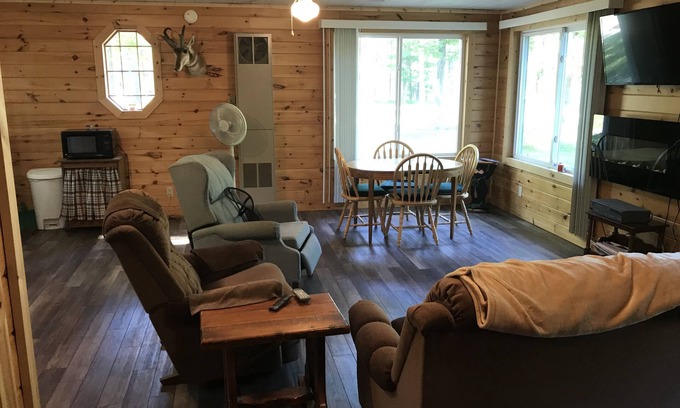 Manistique House | Quaint getaway to unwind and relax.