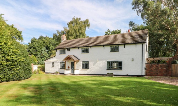 Wilmslow Cottage | QUAKER COTTAGE, pet friendly, with a garden in Wilmslow