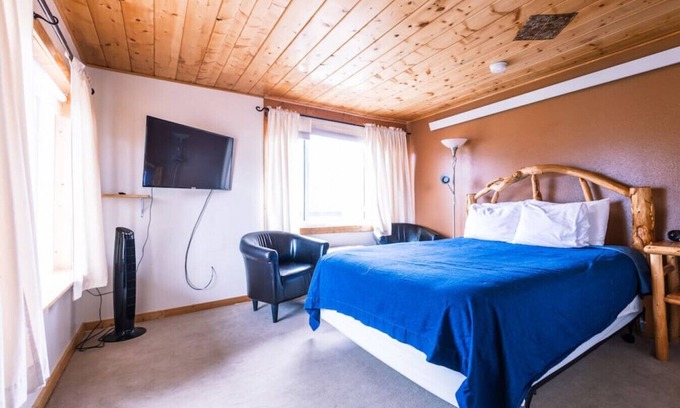 Centennial Apartment | Queen Suite in Historic Centennial Hotel
