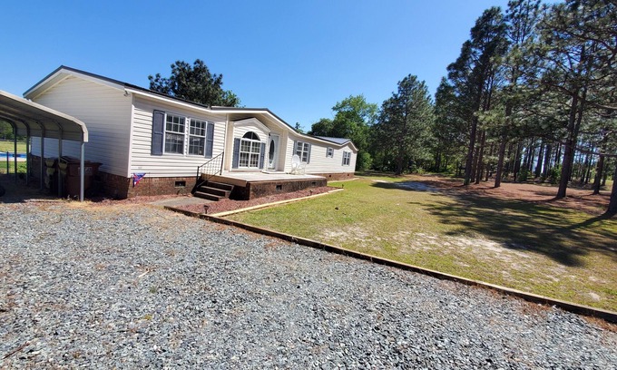 Aberdeen House | Quiet country living only minutes from town & golf.