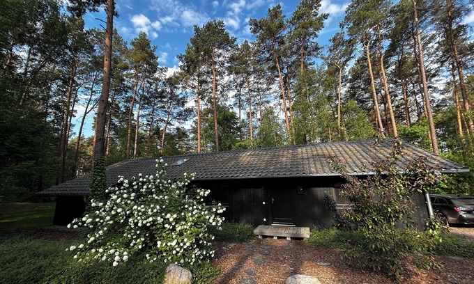Schonberg House | Quiet forest house by a small bathing lake