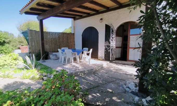 Sa Rocca Tunda Apartment | Quiet Ground Floor Apartment 20 meters from the Sea with Private Garden & BBQ