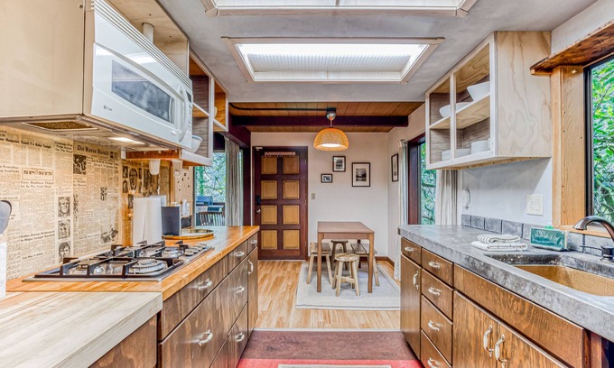 Washougal Cabin | Quiet waterfront cabin on an acre lot with private hot tub & river access