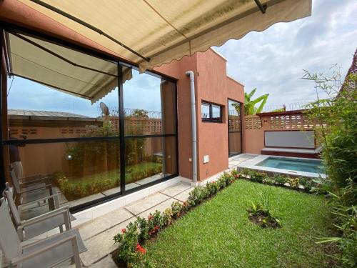Pointe-Noire Apartment | Résidence Akia - Oasis moderne avec Jacuzzi extérieur - Netflix - Wifi - Parking