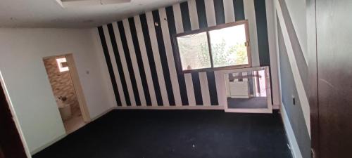 Sharjah Apartment | Rantharu Villa Comfortable Rooms in Al Shabha, Sharjah