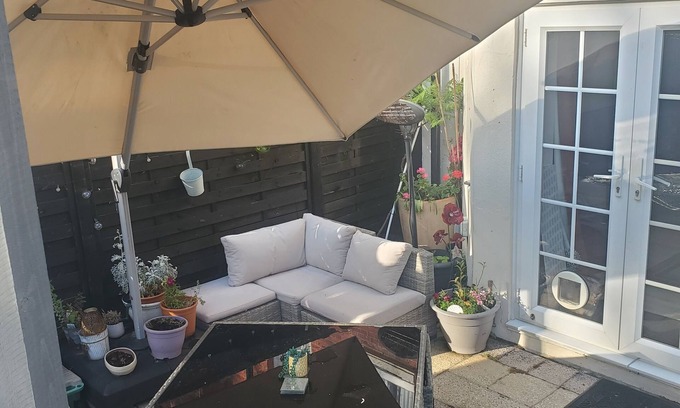 Meads Apartment | Rare basement flat in best location,free parking on site, private sunny patio