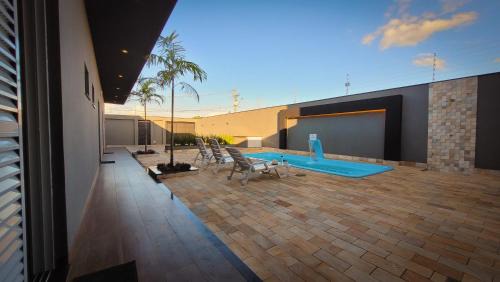 Olimpia House | Recanto dos três Amores