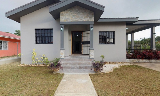 Belama Phase 3 House | Recently constructed home with enclosed yard, full kitchen, entertainment & WiFi