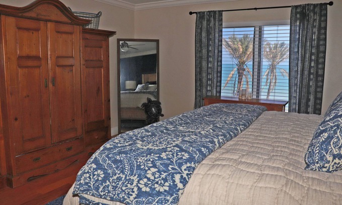 New Smyrna Beach Condo | Recently remodeled fourth floor two-bedroom oceanfront granite countertops, stainless steel appliances.