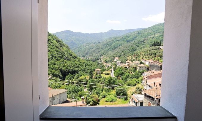 Pigna Apartment | Recently Renovated Flat In The Heart Of Pigna With Panoramic Views and a Balcony