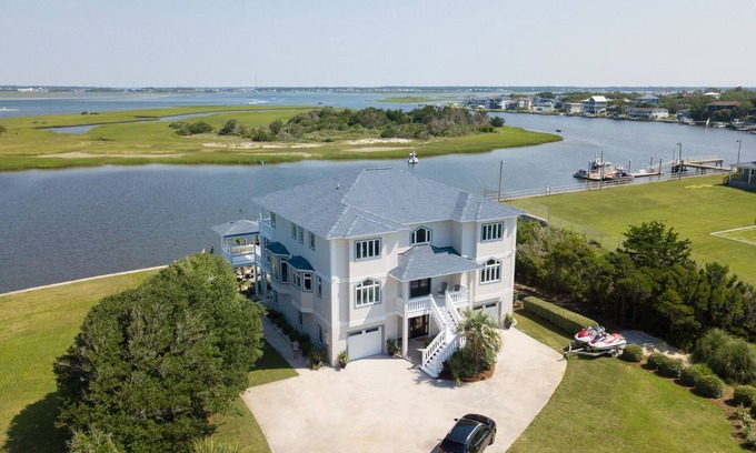 The Point House | Redone Luxury Waterfront at The Point w/Heated Pool, Hot Tub, Fire Pit, Game Rm