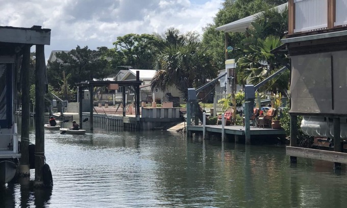 Indian Harbor Estates House | Reel Paradise Cottage- Canal Front- Bring your Boat to our 50’ Dock!