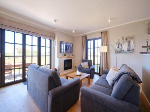 Dranske Villa | Reetland am Meer - Luxus Reetdachvilla mit 3 Schlafzimmern, Sauna und Kamin H20
