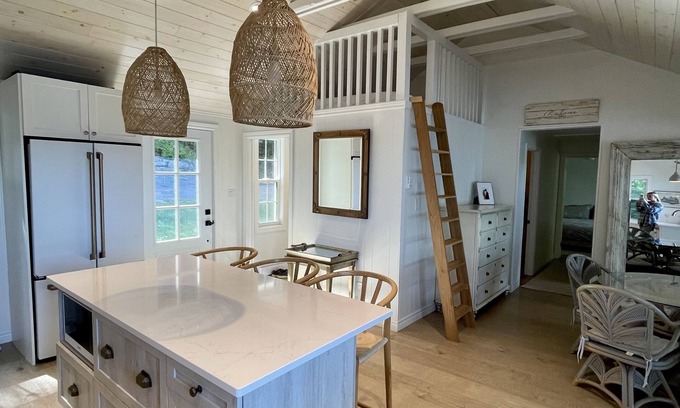 Frontenac Cottage | Refurbished cottage on Loughborough Lake w/deck featuring sunset views.