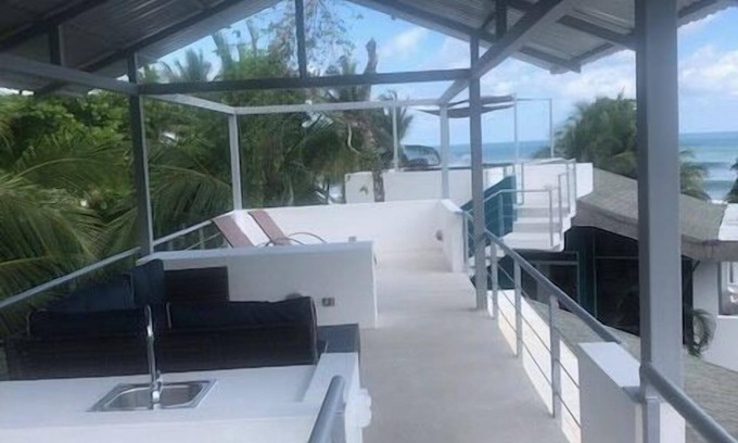 Esterillos Oeste Villa | Relax and enjoy sea breezes and sea views on the roof top patio.