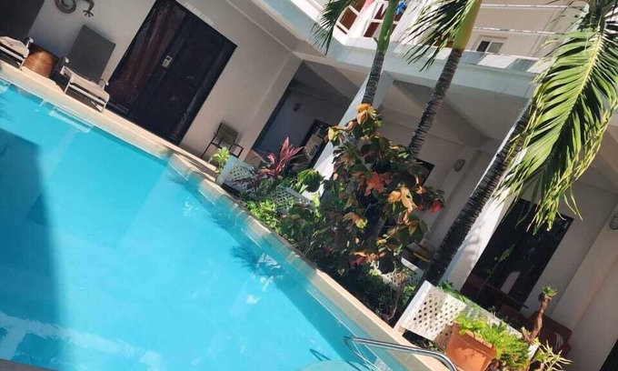Caye Caulker Apartment | Relax and Unwind in Our Serene Poolside Studio Retreat!"