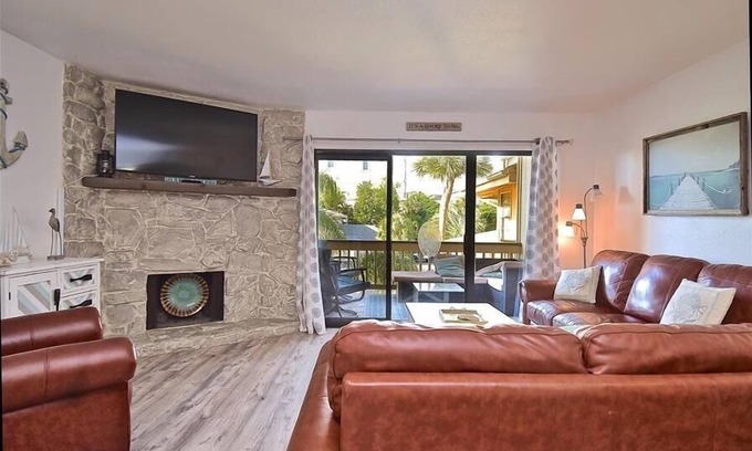 Siesta Key Condo | Relax at Cozy Cove! Waterfront w/Large Pool & Boat Dock. Short walk to Turtle Beach. CC4