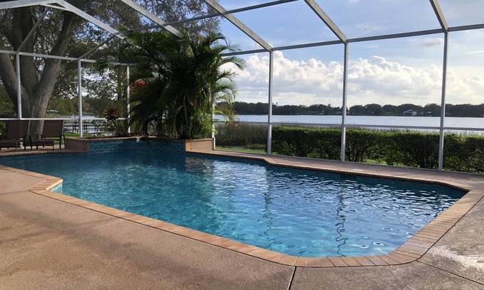 Auburndale House | Relax at Southern Exposure in Auburndale with a Pool & 76 Acre Private Lake.