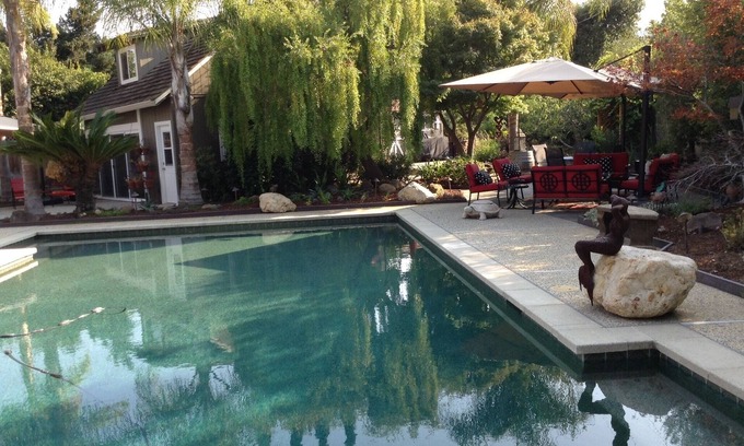 Los Gatos Cottage | Relax in your private garden by the pool.
