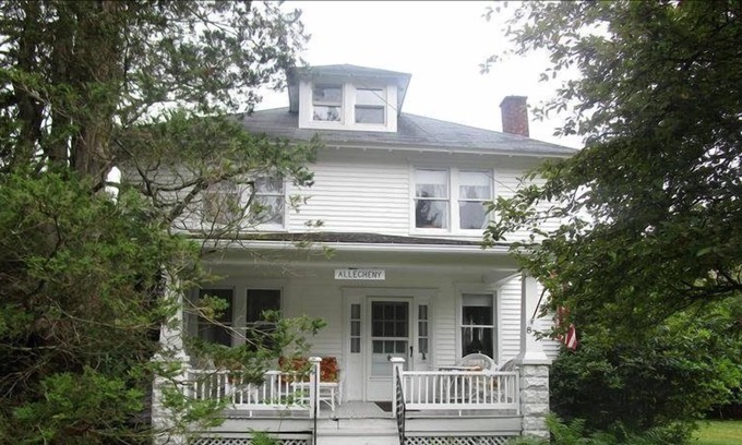 Eagles Mere Cottage | Relax on the covered front porch at "Allegheny" in Eagles Mere