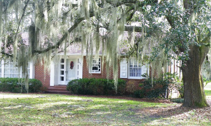 Woodbine House | Relax on the Screened Porch or Enjoy the Nearby Area Attractions