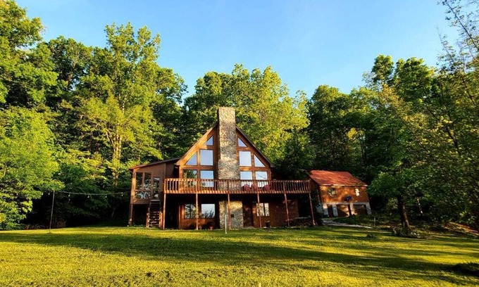 Irvine House | Relax & Recharge A Frame Retreat firepit hot tub sauna gym fishing forest escape